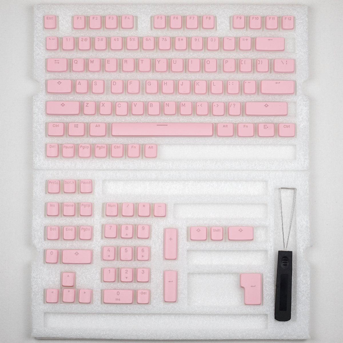 Różowe keycapy Pudding